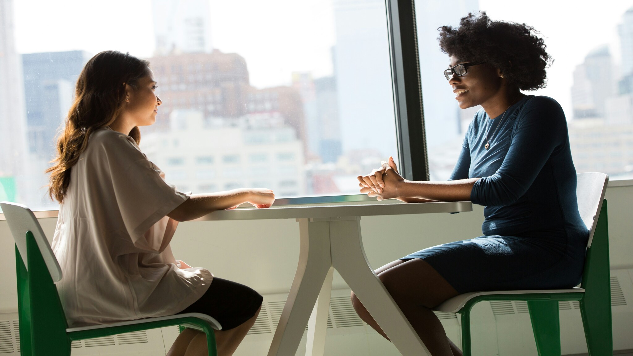 Client talking with a therapist during an in-person therapy session in Denver, CO
