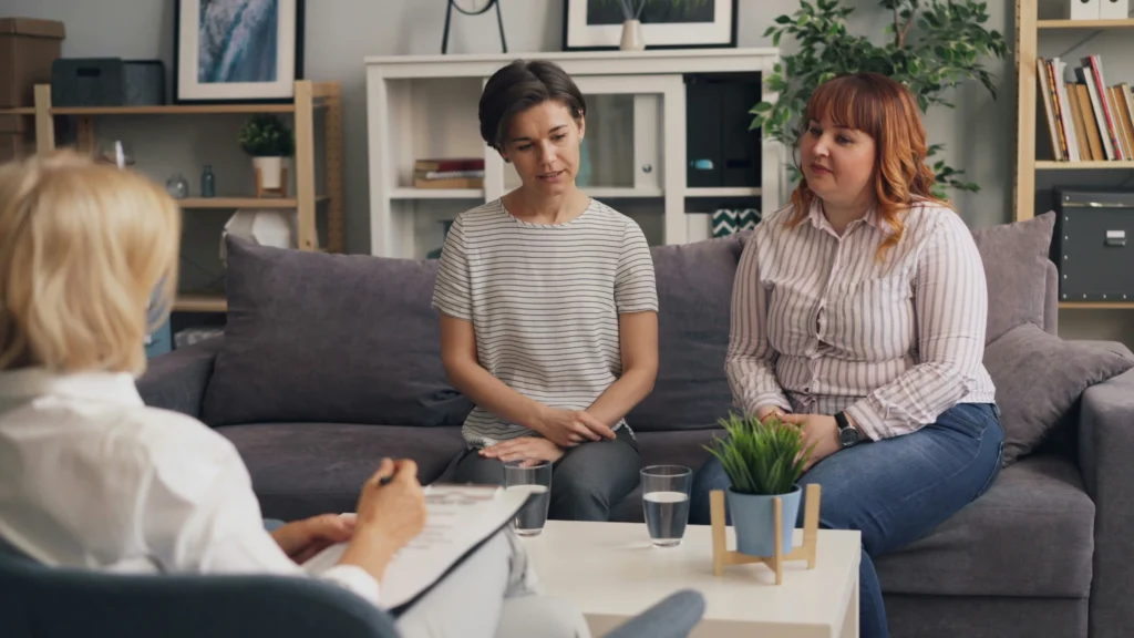 Couple attending therapy to address emotional disconnection and relationship challenges