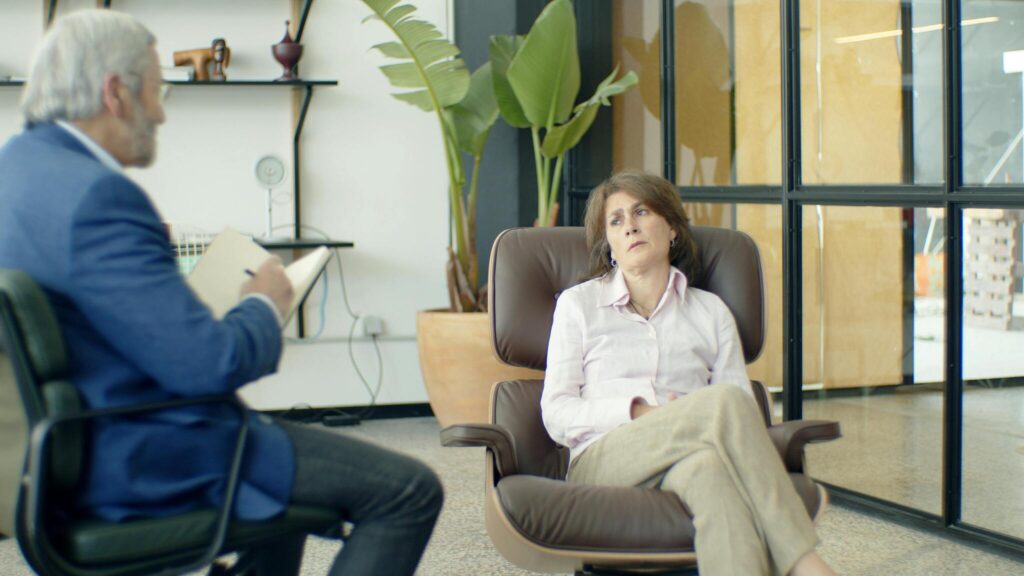 Client speaking with a therapist during an EMDR therapy session