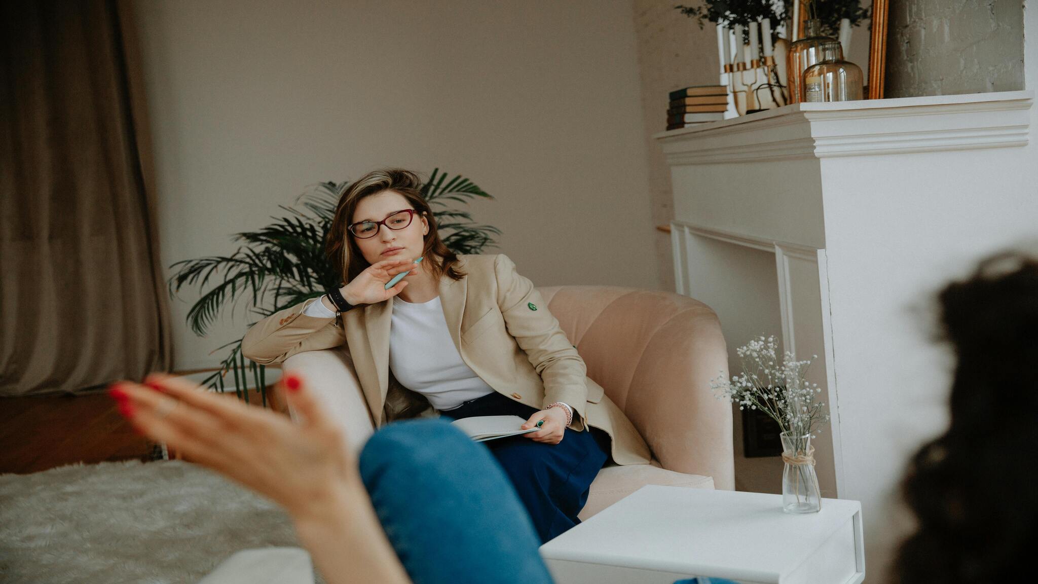 Client speaking with a therapist during an individual trauma therapy session