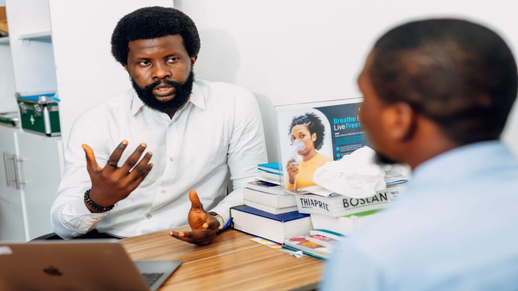 Therapist talking with a client about progress during trauma therapy